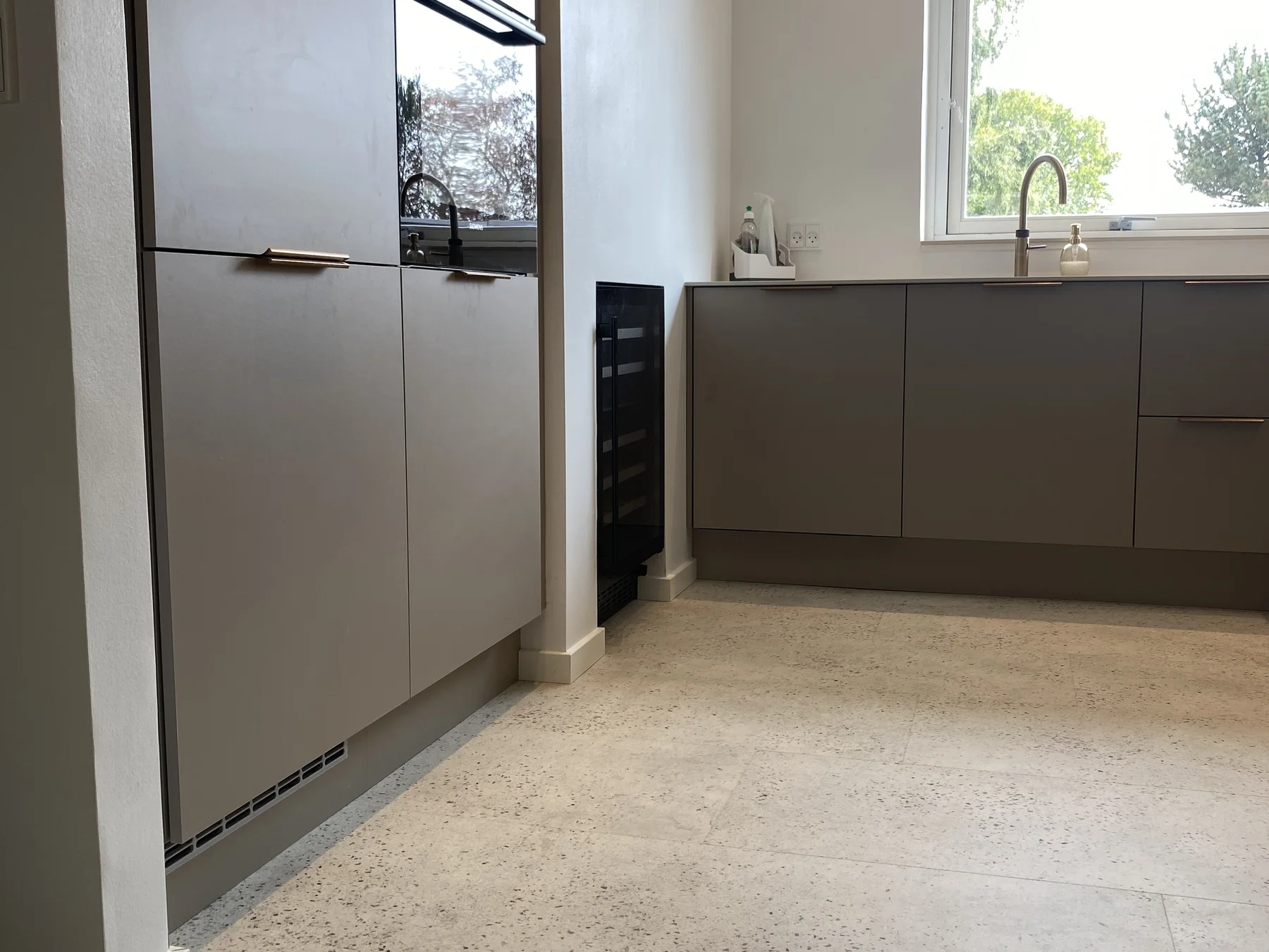 The new kitchen viewed towards the open entrance area
