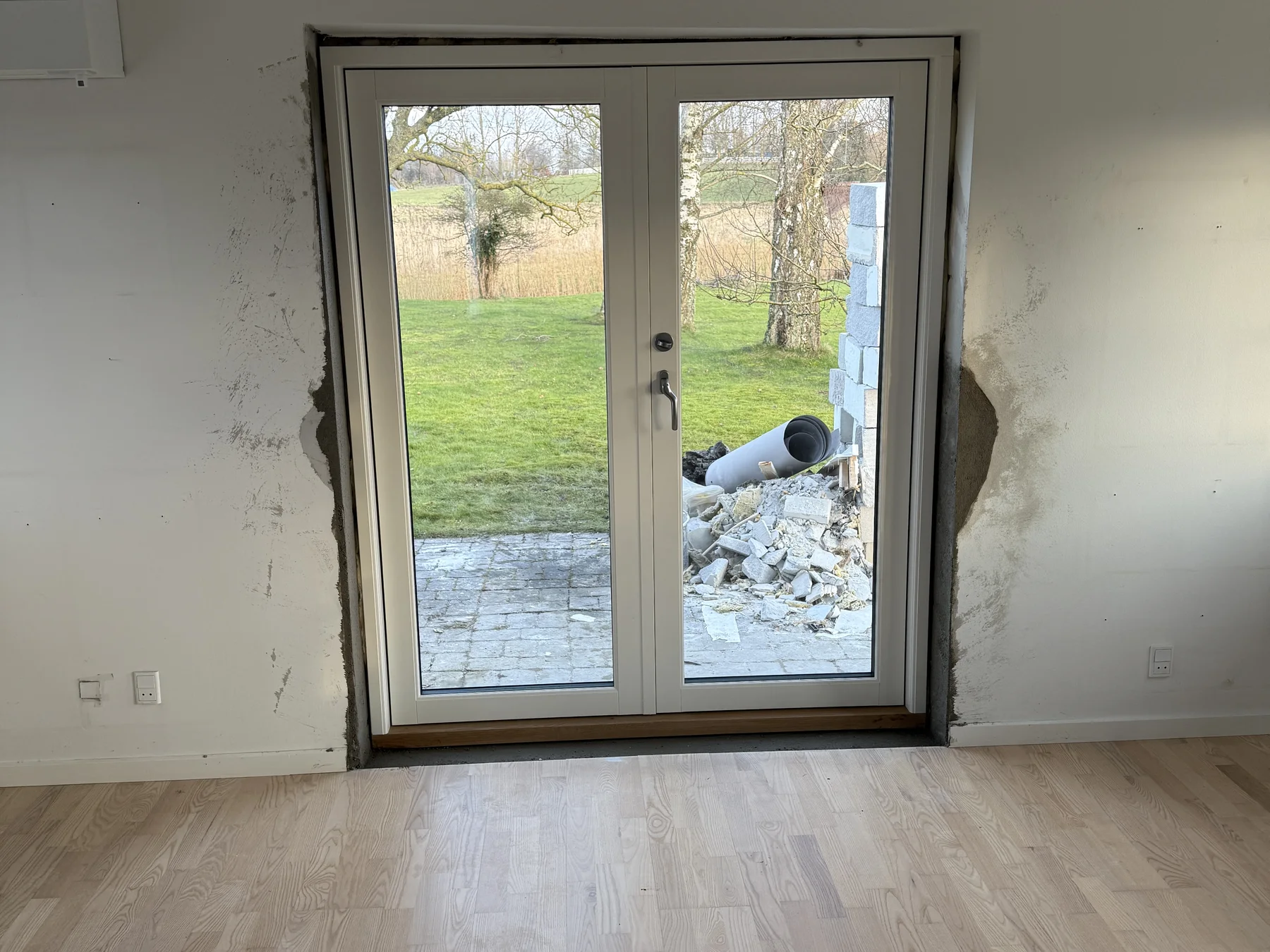 New double patio door between the living area and garden